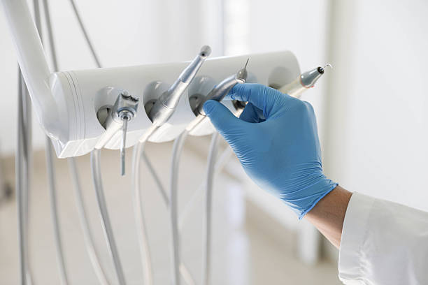 Professional Tooth Extraction technician working in Long Branch, VA